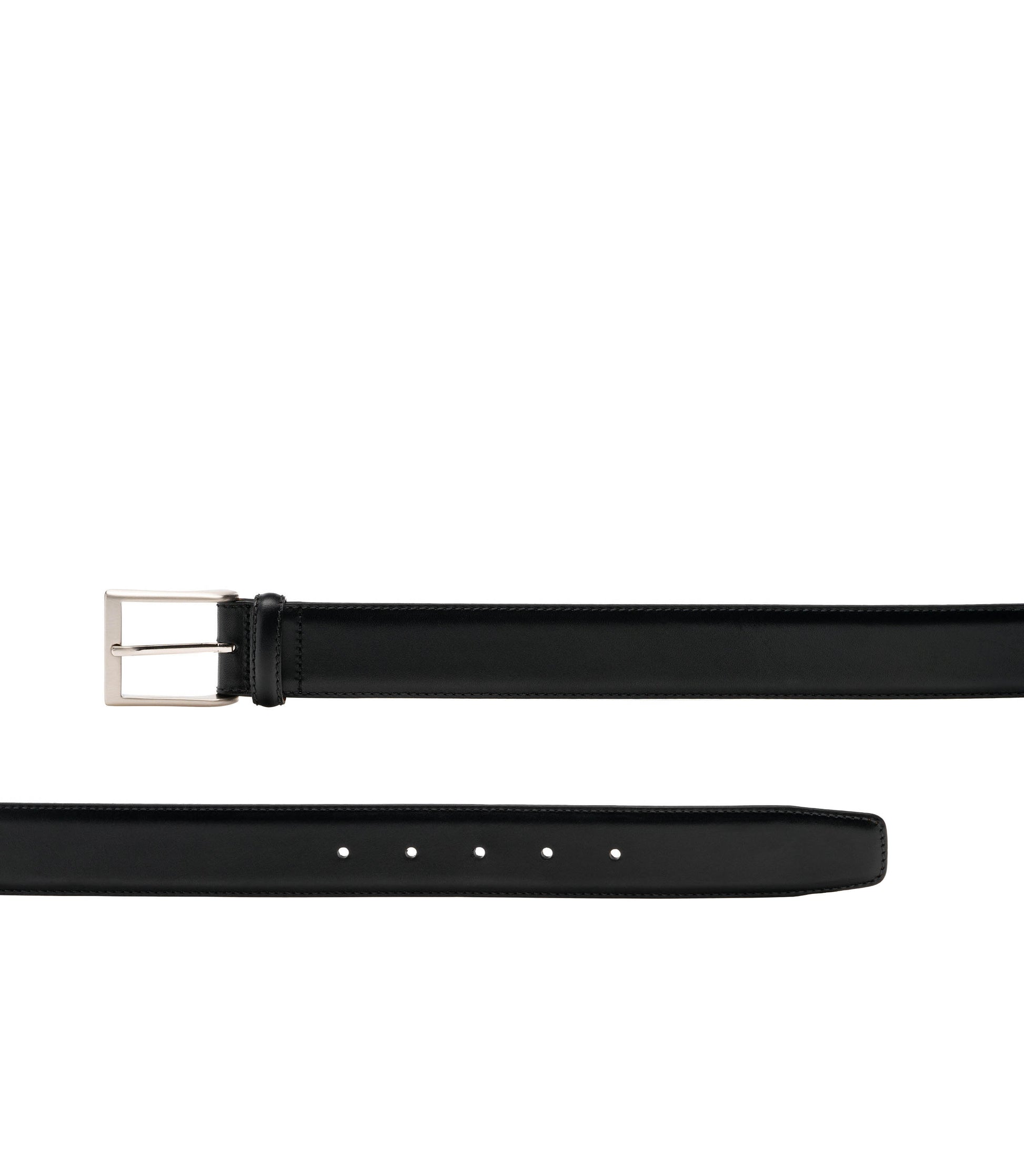 Black belt with silver buckle on a white background