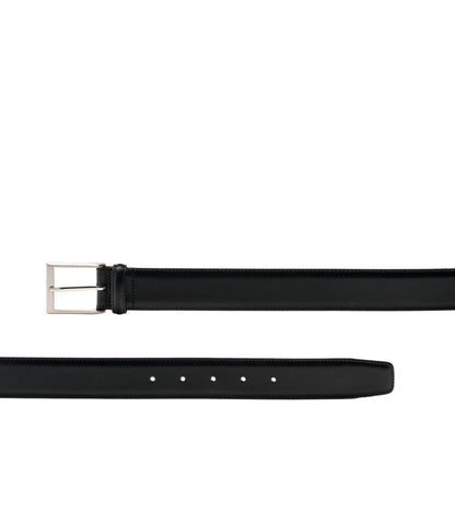 Black belt with silver buckle on a white background